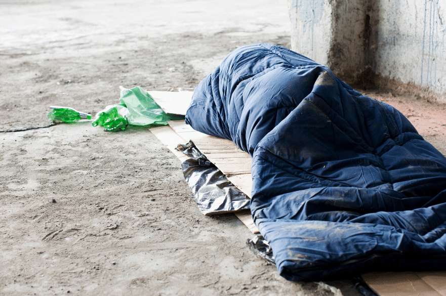 Sleeping bag on pavement