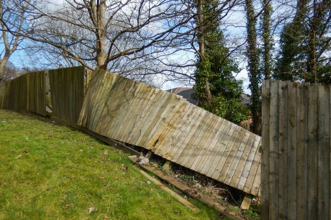 Broken fence in garden