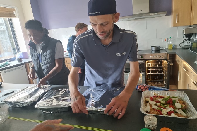 Residents at Milestone House cooking